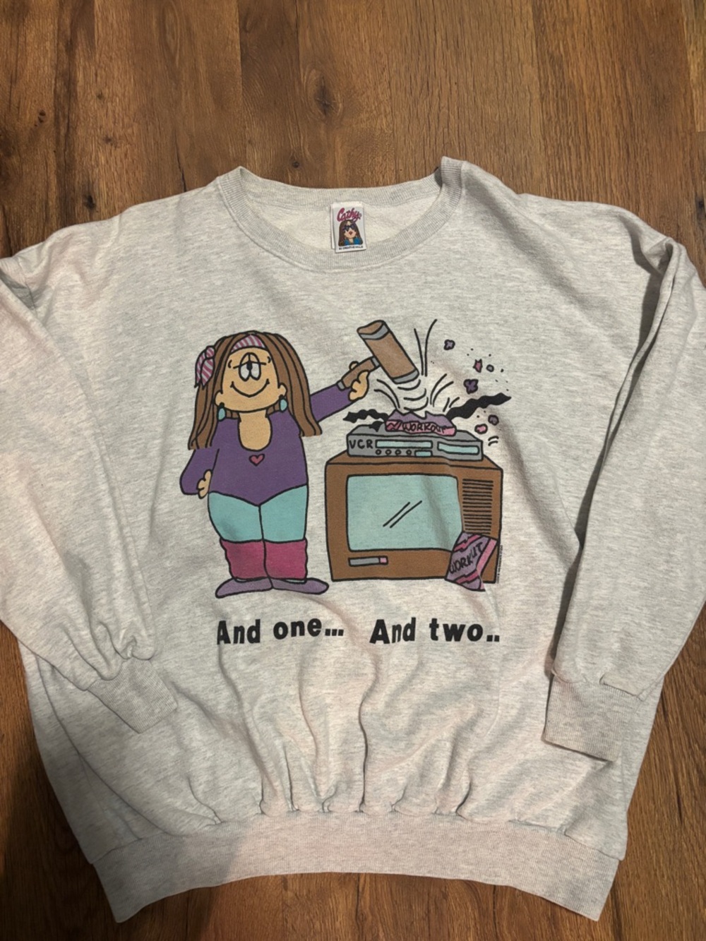 Vintage Cartoon Graphic Sweatshirt with Pastel Colors